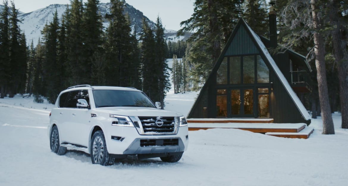 Nissan Pathfinder parked in deep snow