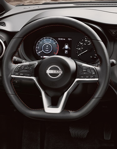 2024 Nissan Kicks interior view of D shaped steering wheel