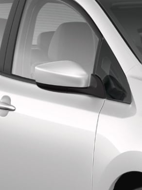 2024 Nissan LEAF in white showing integrated LED turn signal indicators