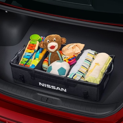Nissan removable trunk organizer filled with childrens' toys