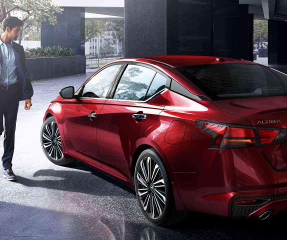 Angled rear view of red 2024 Nissan Altima 