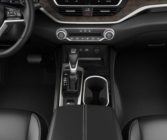 Centre console in the 2024 Nissan Altima with light grey interior