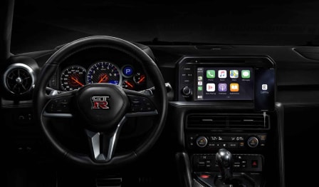 2024 Nissan GT-R touch-screen showing Apple CarPlay® map.