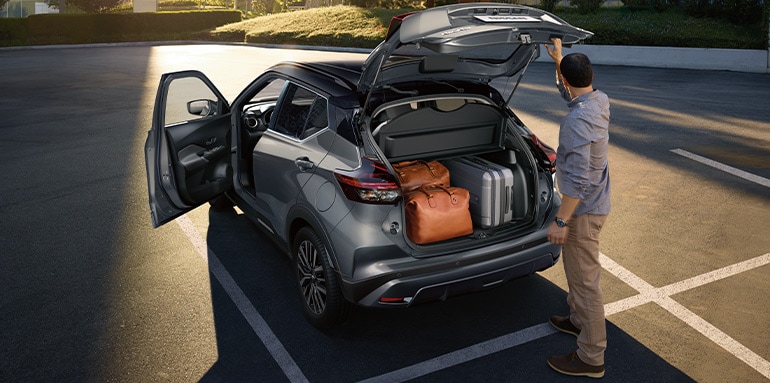 Nissan Kicks view of hatch open and cargo area with luggage